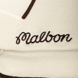 Close up of Tan shirt, showing texture of the 60% viscose/ 25% polyester/ 15% elastane fabric