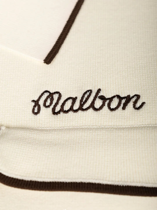 Close up of Tan shirt, showing texture of the 60% viscose/ 25% polyester/ 15% elastane fabric