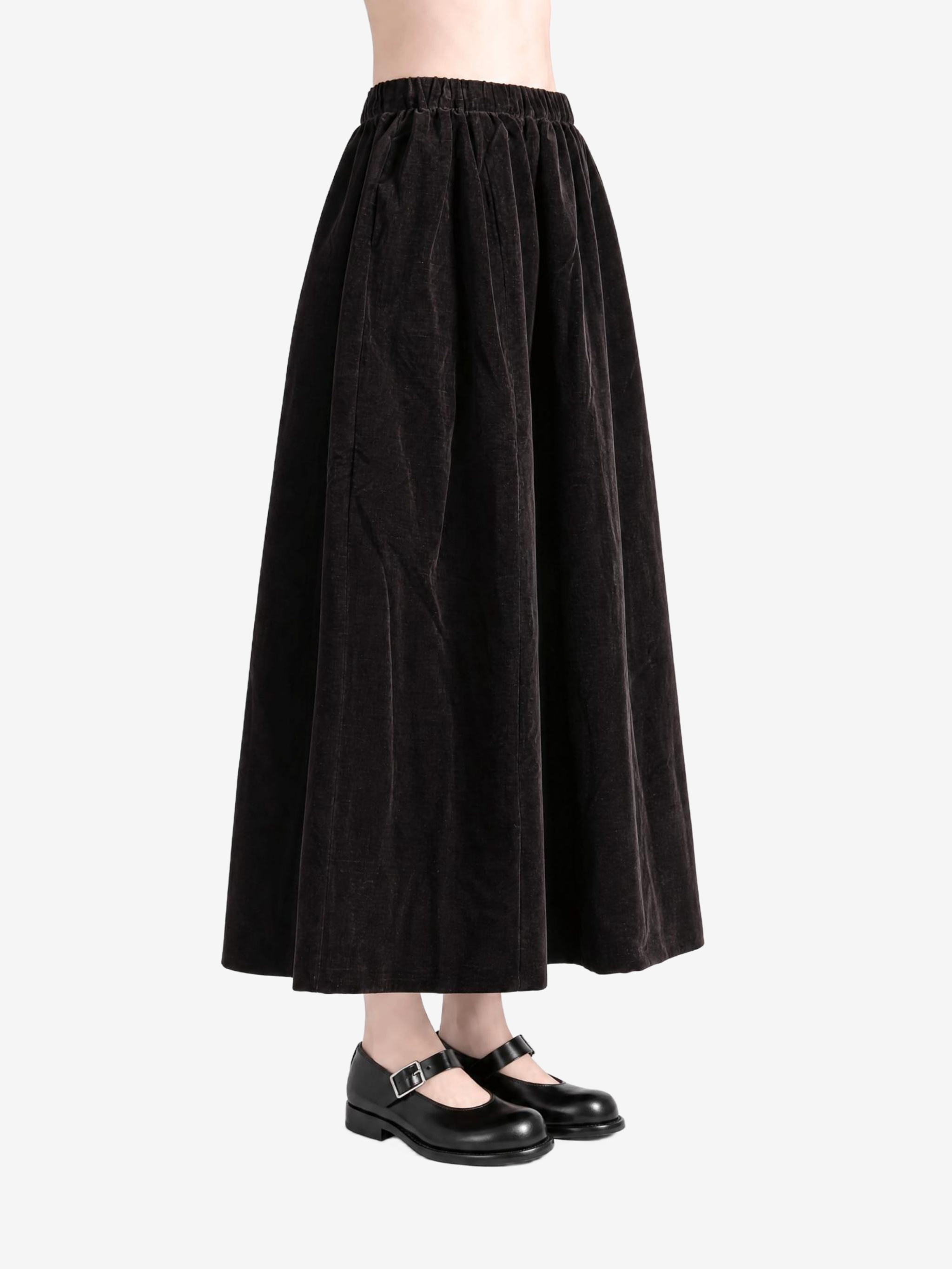 Black skirt worn by a person, showing the skirt fit