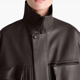 Close up of the brown coats, showing texture of the blended fabric