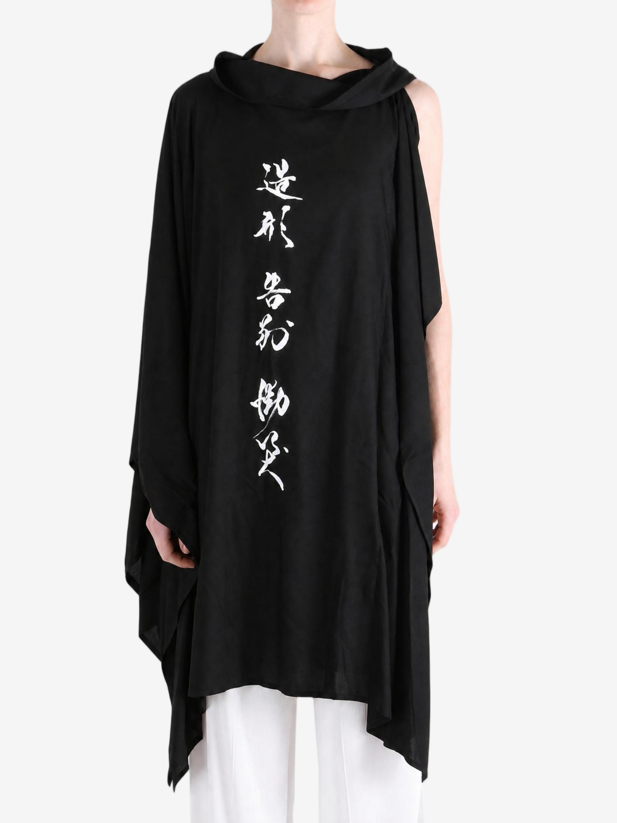 Black dress worn by a person, showing the dress fit
