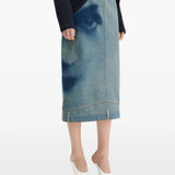 Blue skirt worn by a person, showing the skirt fit