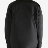Black jacket worn by a person, showing the jacket's fit