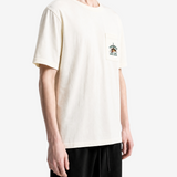 Tan t-shirt worn by a person, showing the t-shirt fit