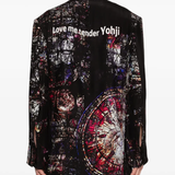 Black jacket worn by a person, showing the jacket's fit