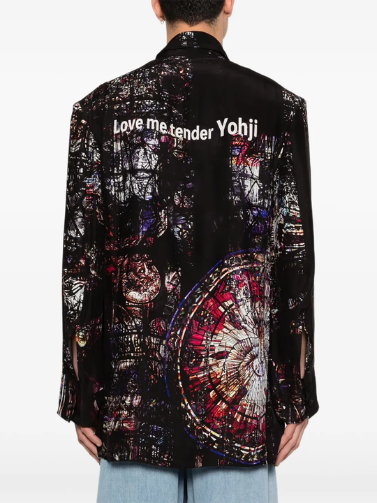 Black jacket worn by a person, showing the jacket's fit