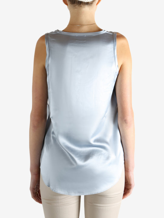 Grey t-shirts worn by a person, showing the t-shirts fit