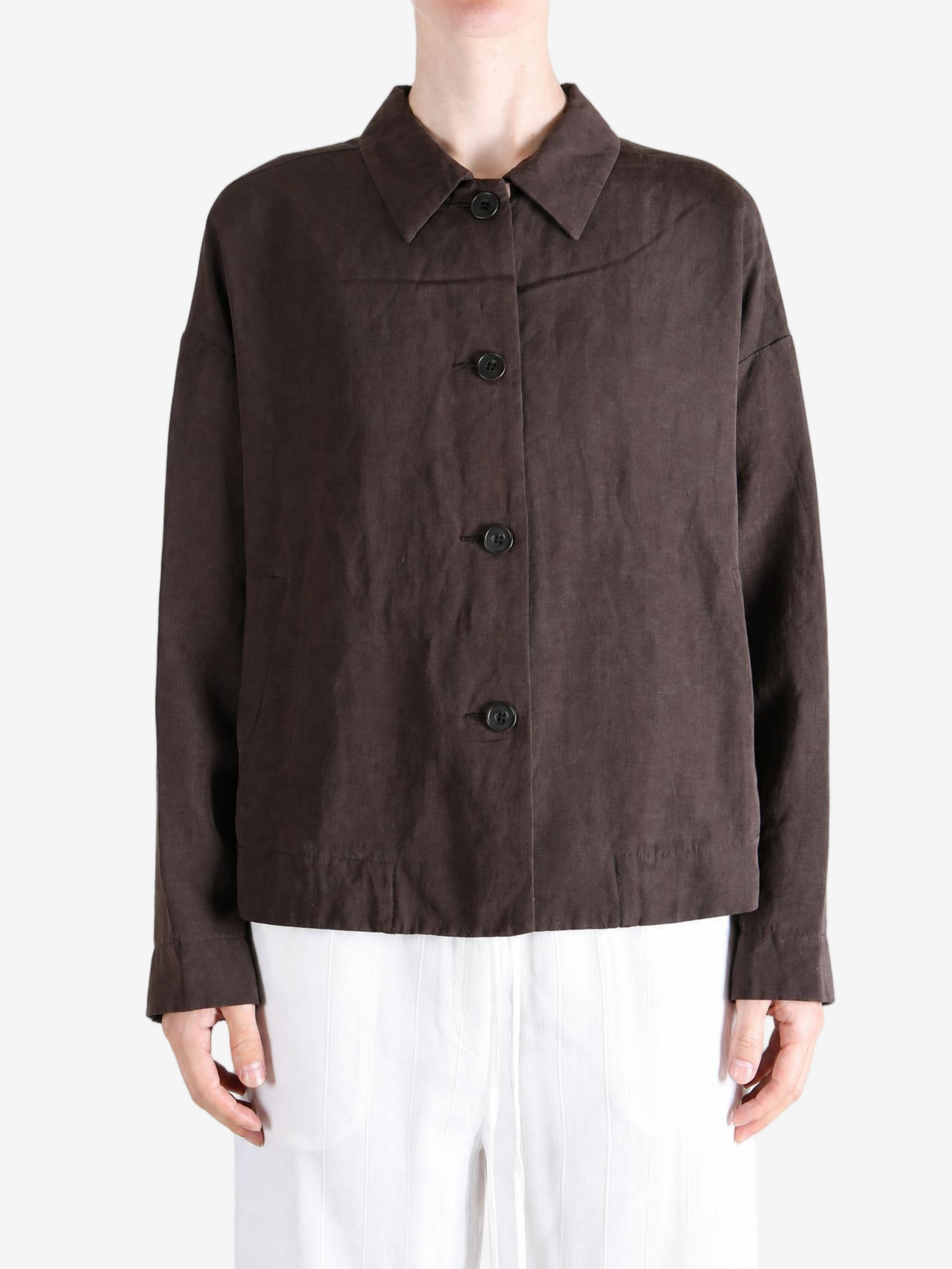 Brown jacket worn by a person, showing the jacket fit