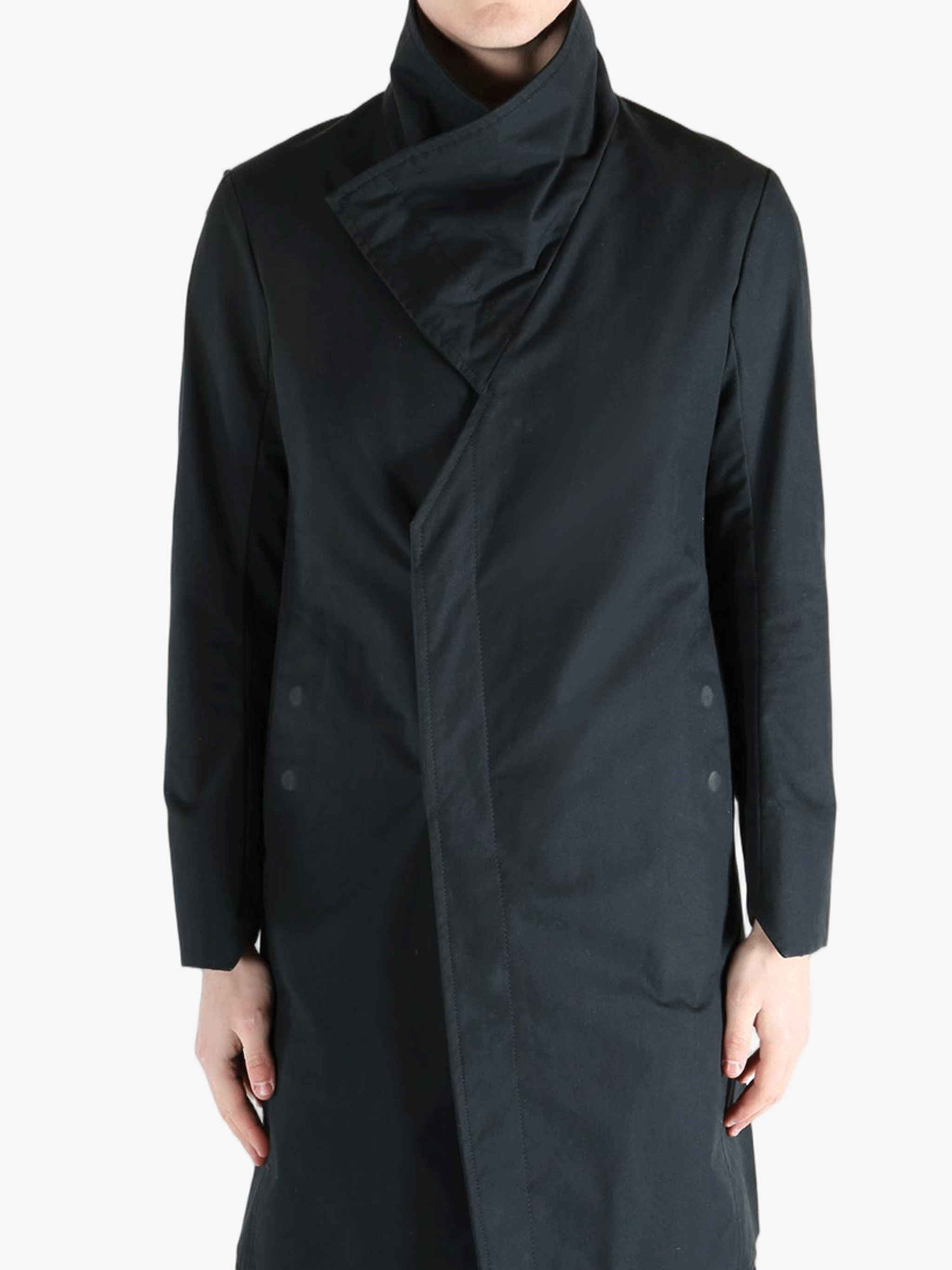 Black jacket worn by a person, showing the jacket's fit