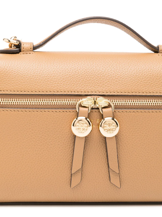 Close up of Tan bags, showing texture of the cow leather fabric
