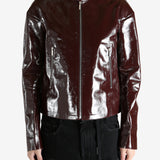 Burgundy jacket worn by a person, showing the jacket's fit