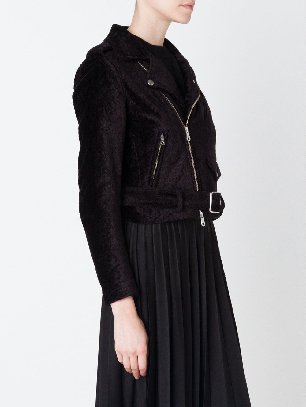 Black jacket worn by a person, showing the jacket's fit