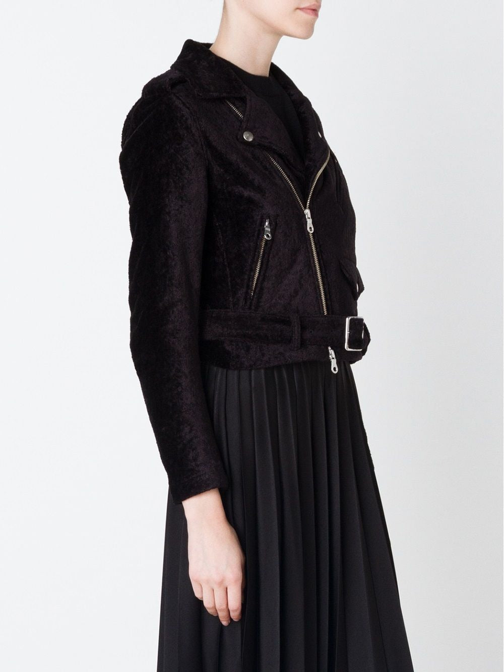 Black jacket worn by a person, showing the jacket's fit