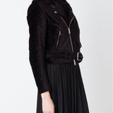 Black jacket worn by a person, showing the jacket's fit