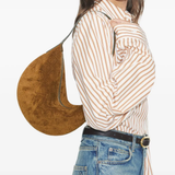 Brown bag worn by a person, showing the bag fit
