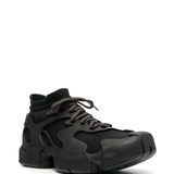 Black sneakers, side view