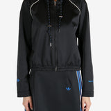 Black hoodie worn by a person, showing the hoodie's fit