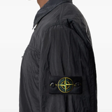 Close up of the black jacket, showing texture of the polyamide fabric