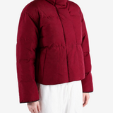 Burgundy jacket worn by a person, showing the jacket fit