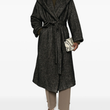 Black coat  worn by a person, showing the coat's fit