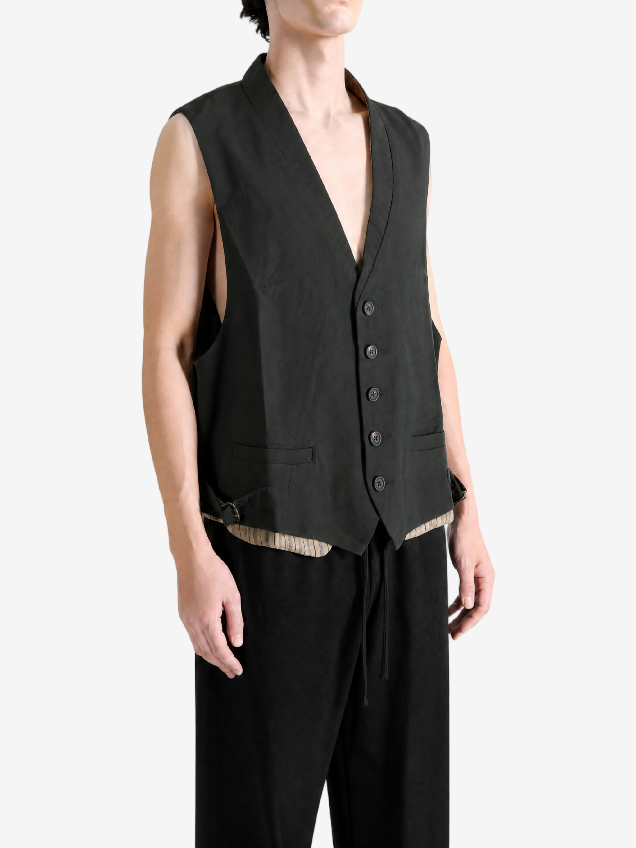 Black jacket worn by a person, showing the jacket fit