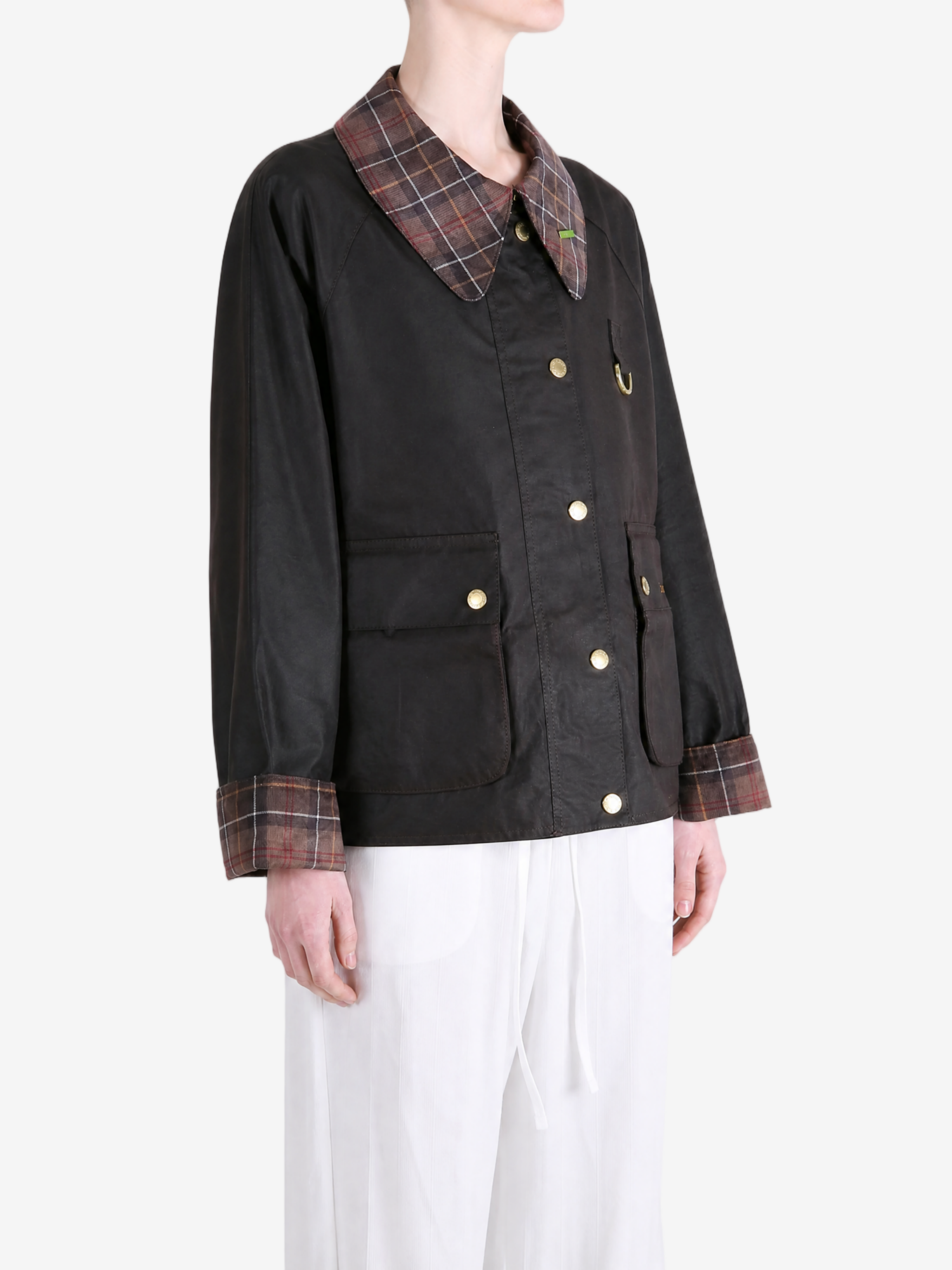 Black jacket worn by a person, showing the jacket fit