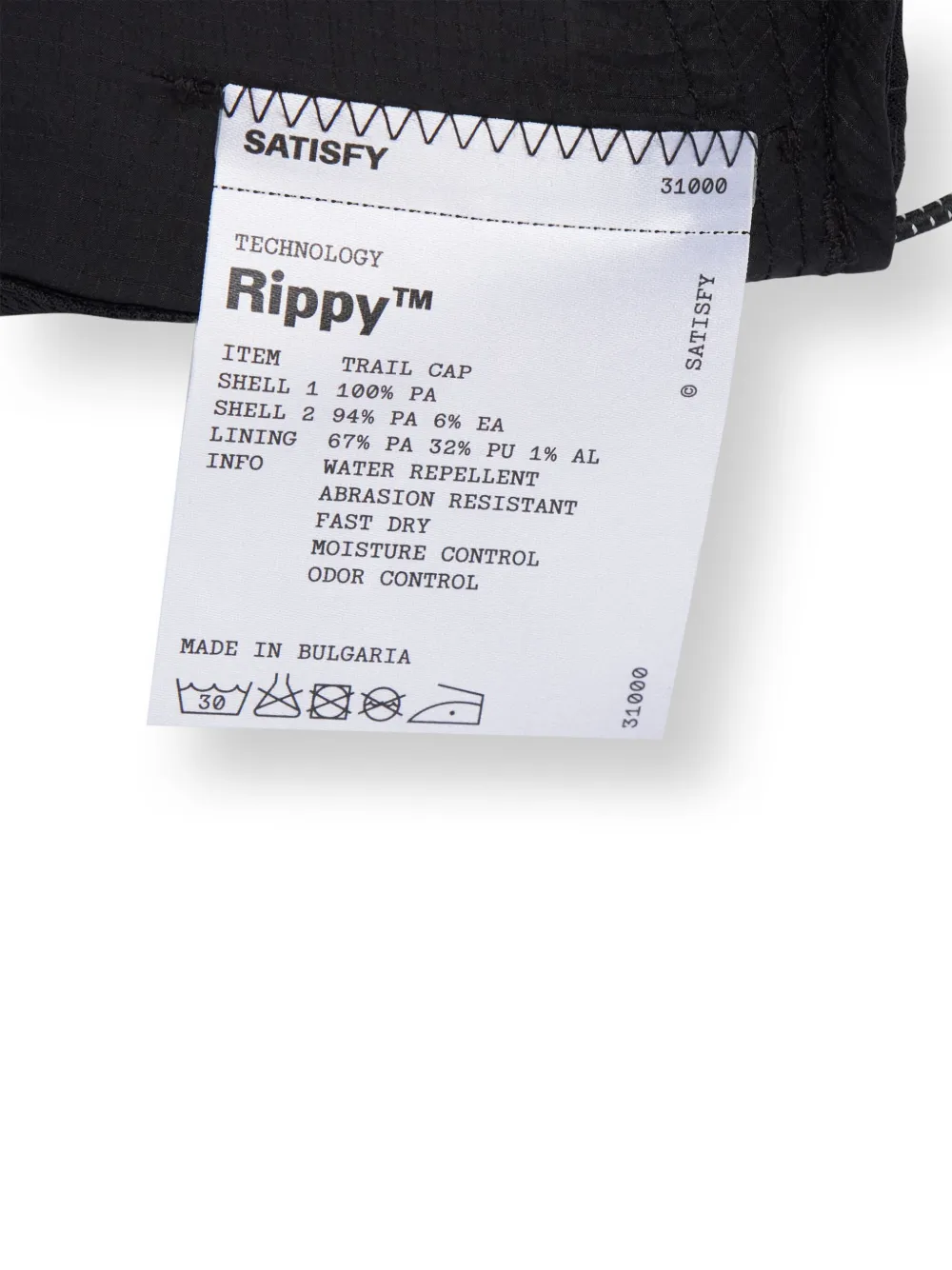 Close up of black hat, showing texture of the polyamide fabric