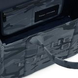 Close up of blue bags, showing texture of the cotton fabric.