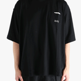 Black t-shirt worn by a person, showing the shirt's fit