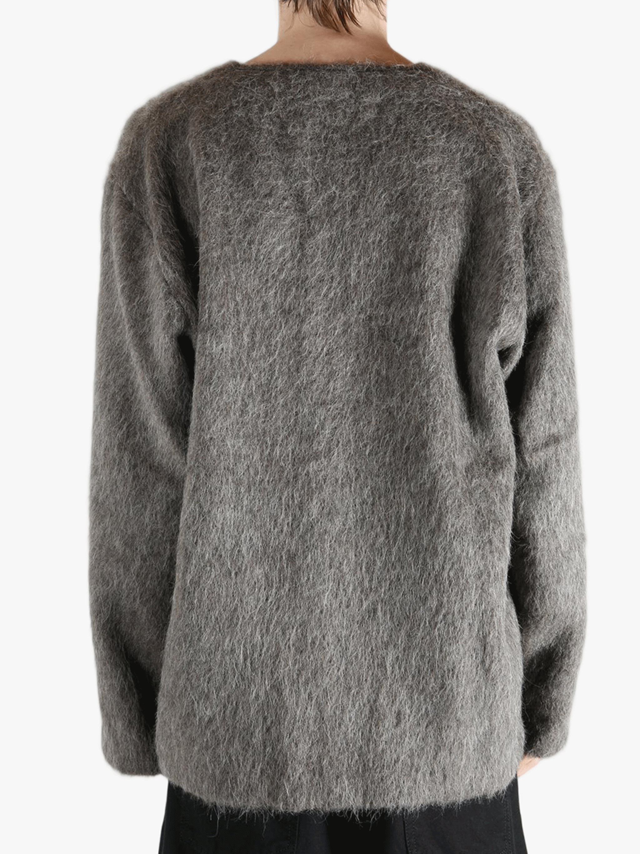 Grey cardigan worn by a person, showing the cardigan's fit