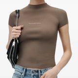 Brown t-shirt worn by a person, showing the t-shirt fit