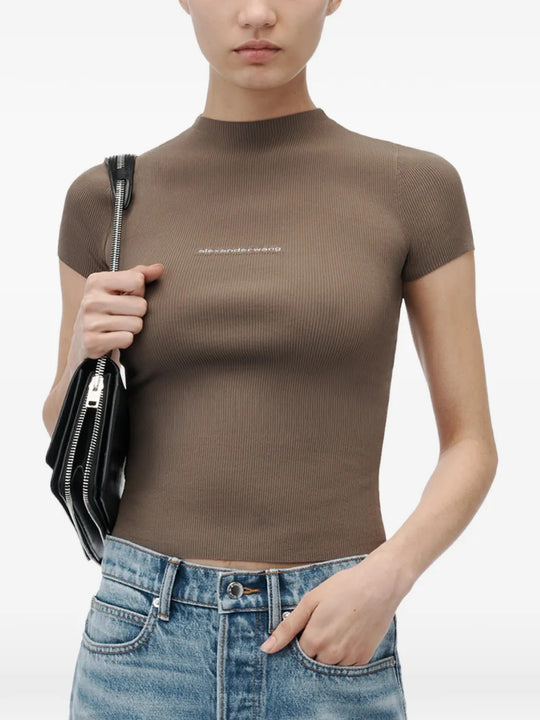 Brown t-shirt worn by a person, showing the t-shirt fit
