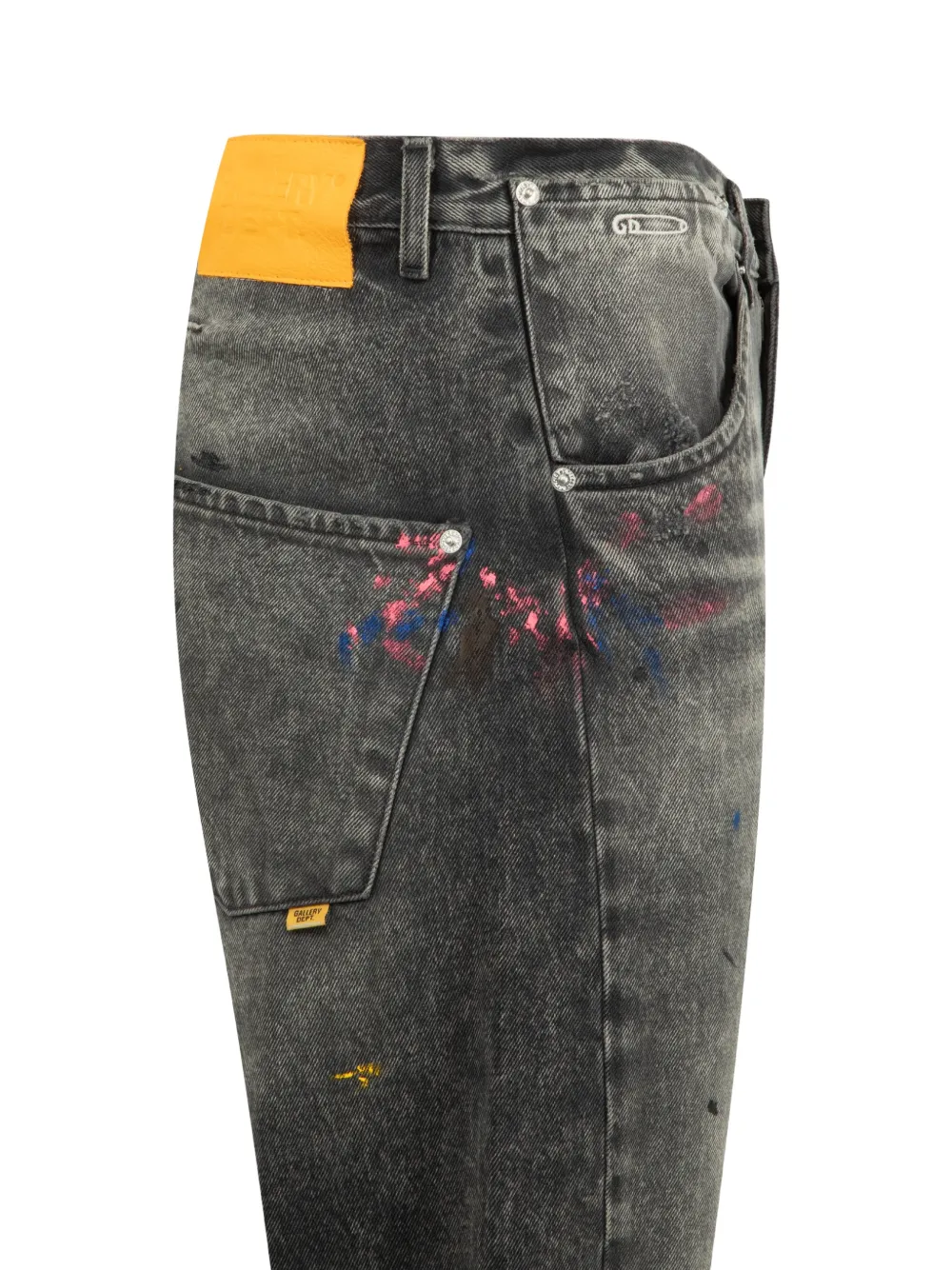 Close up of black jeans, showing texture of the cotton fabric