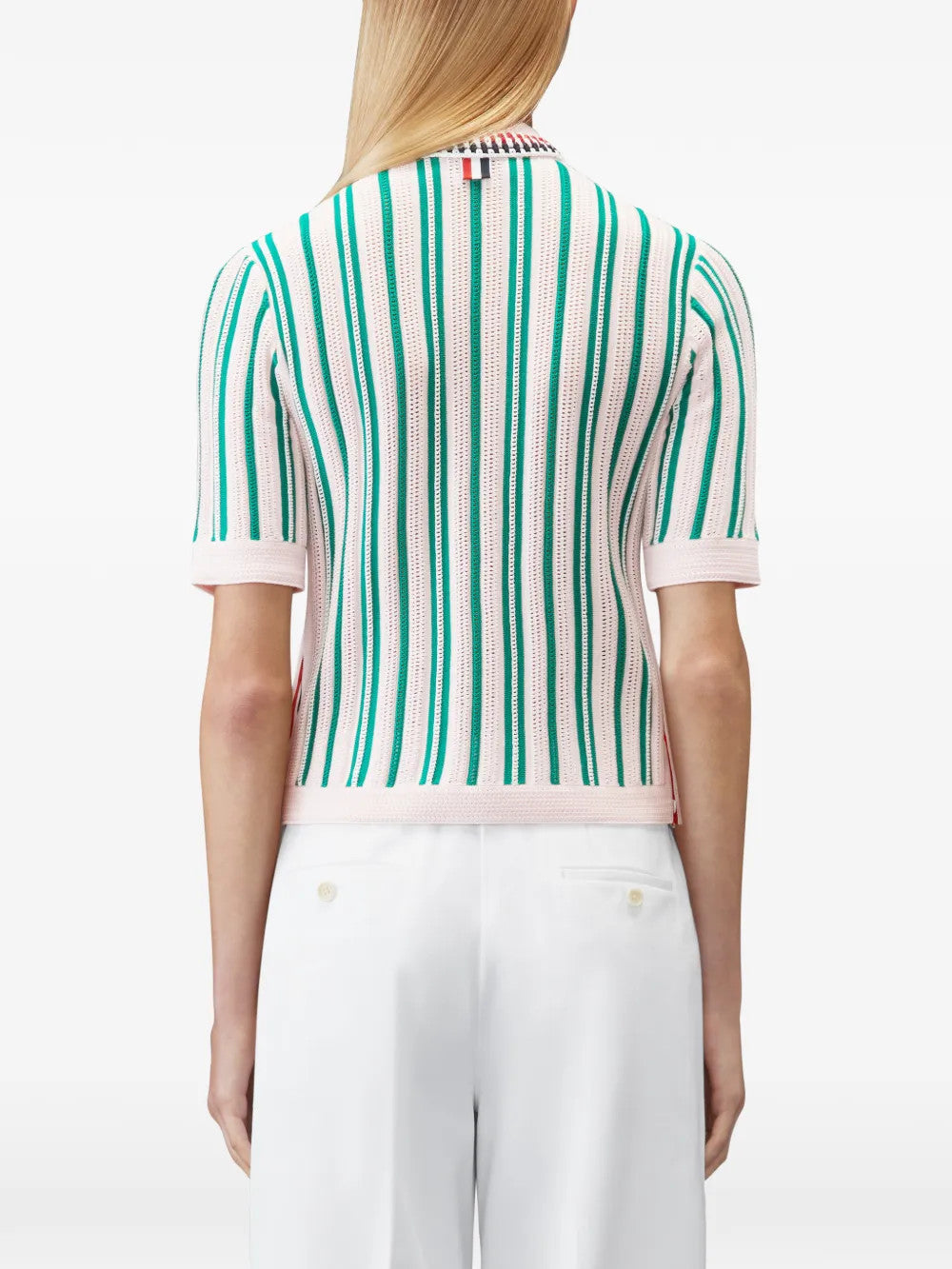 Pink shirt worn by a person, showing the shirt fit