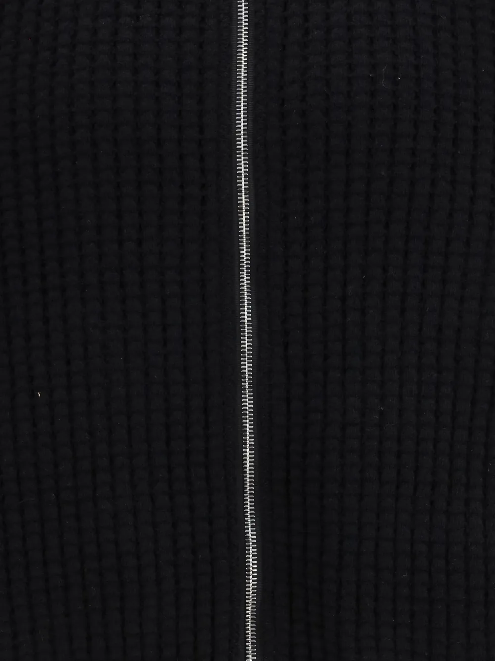 Close up of black jacket,showing texture of the wool fabric