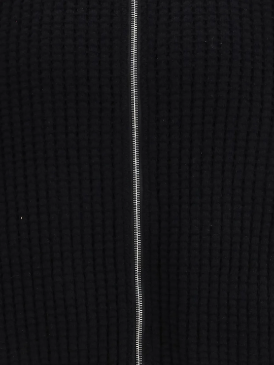 Close up of black jacket,showing texture of the wool fabric