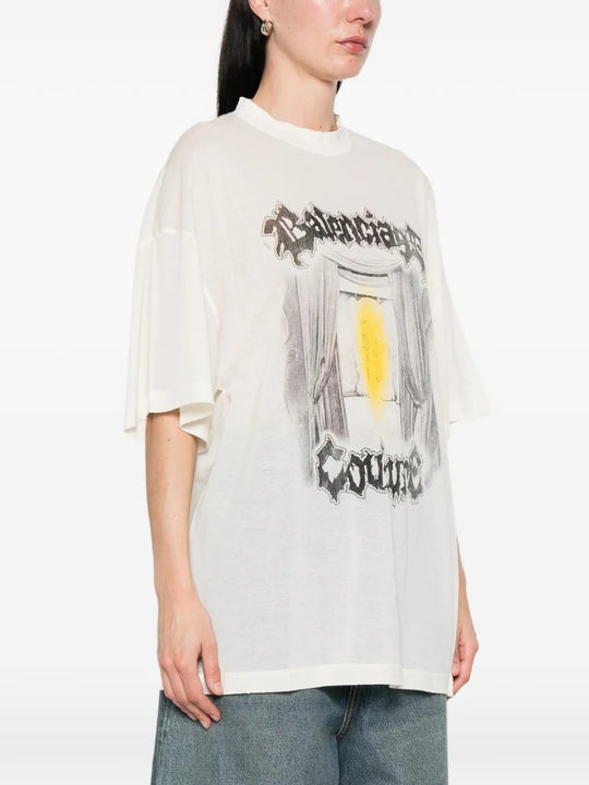 White t-shirt worn by a person, showing the t-shirt's fit