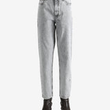 Grey pants worn by a person, showing the pants fit