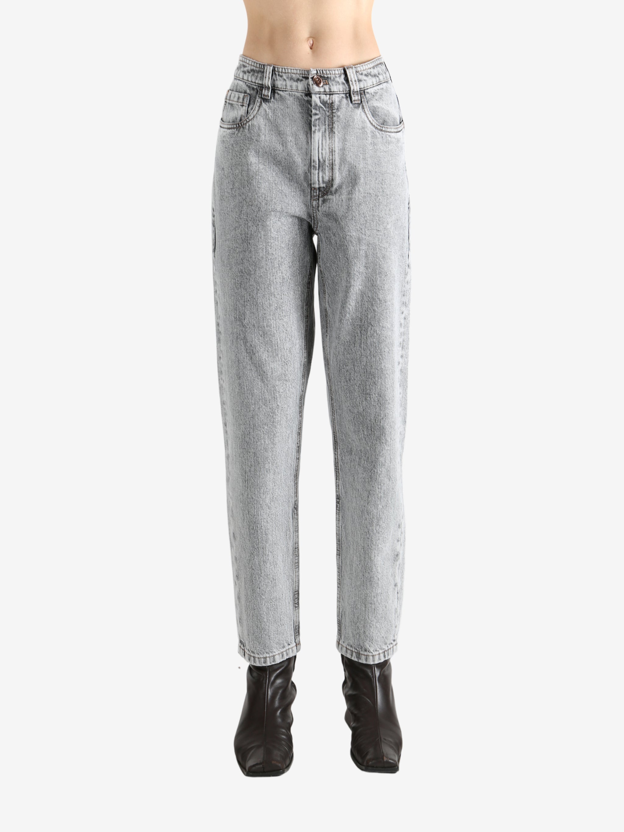 Grey pants worn by a person, showing the pants fit