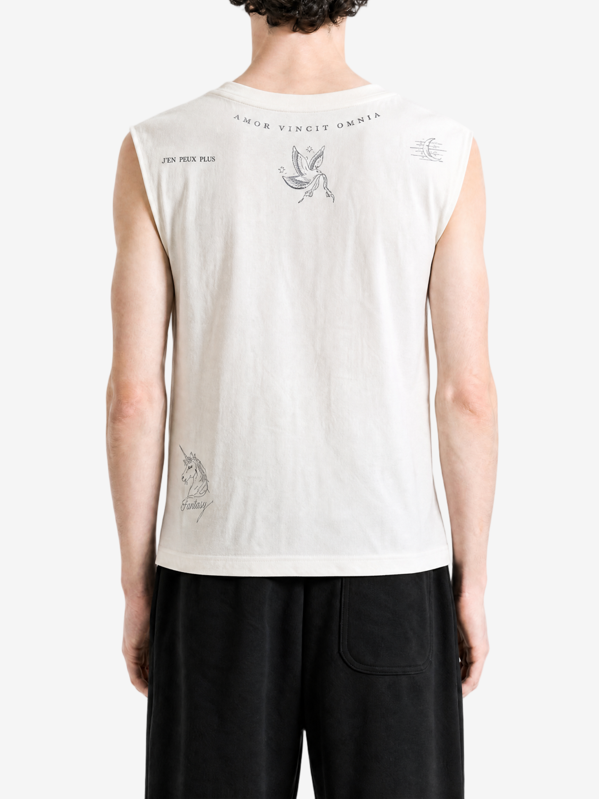White t-shirt worn by a person, showing the t-shirt fit
