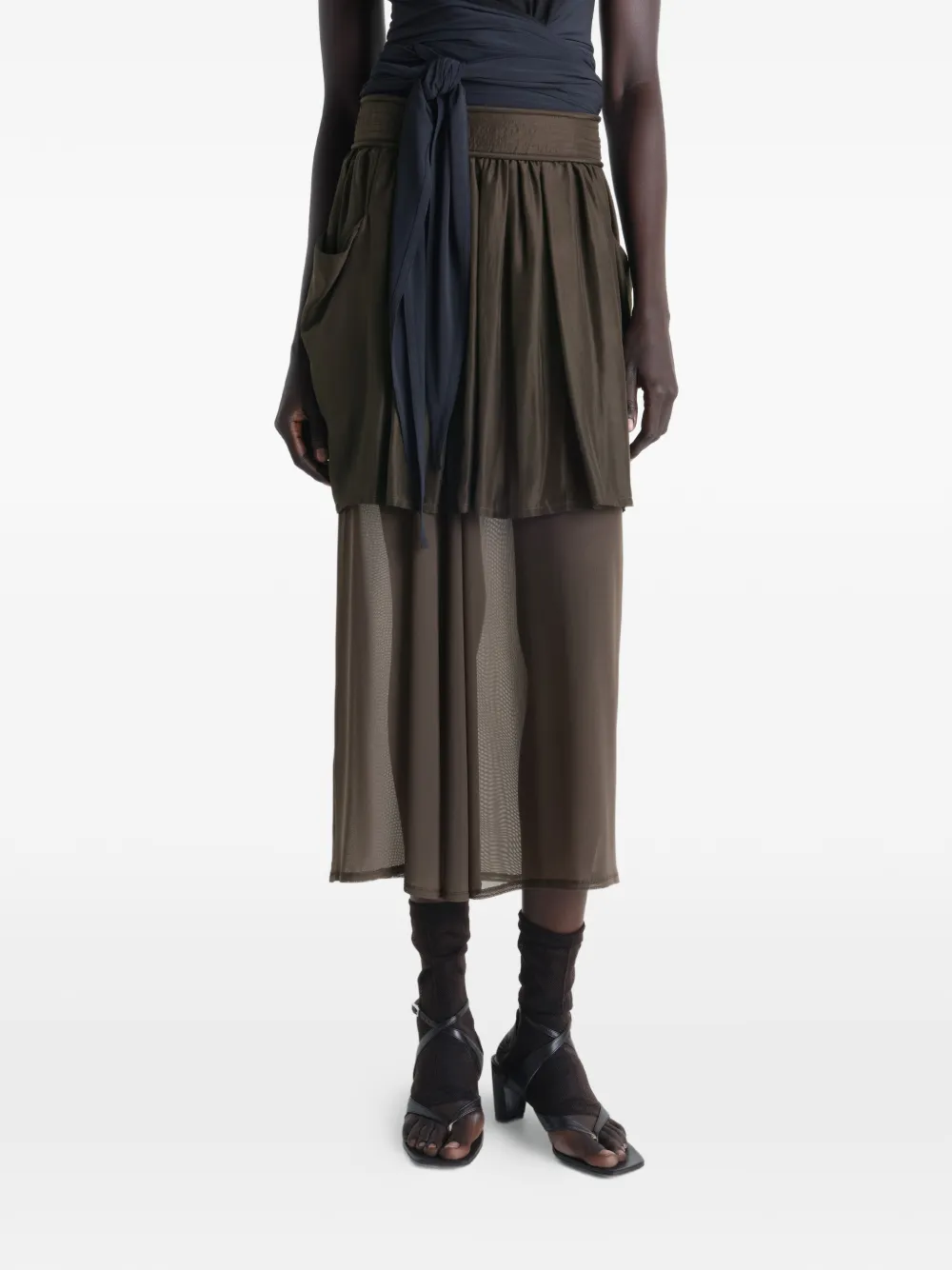 Brown skirt worn by a person, showing the skirt fit