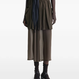 Brown skirt worn by a person, showing the skirt fit