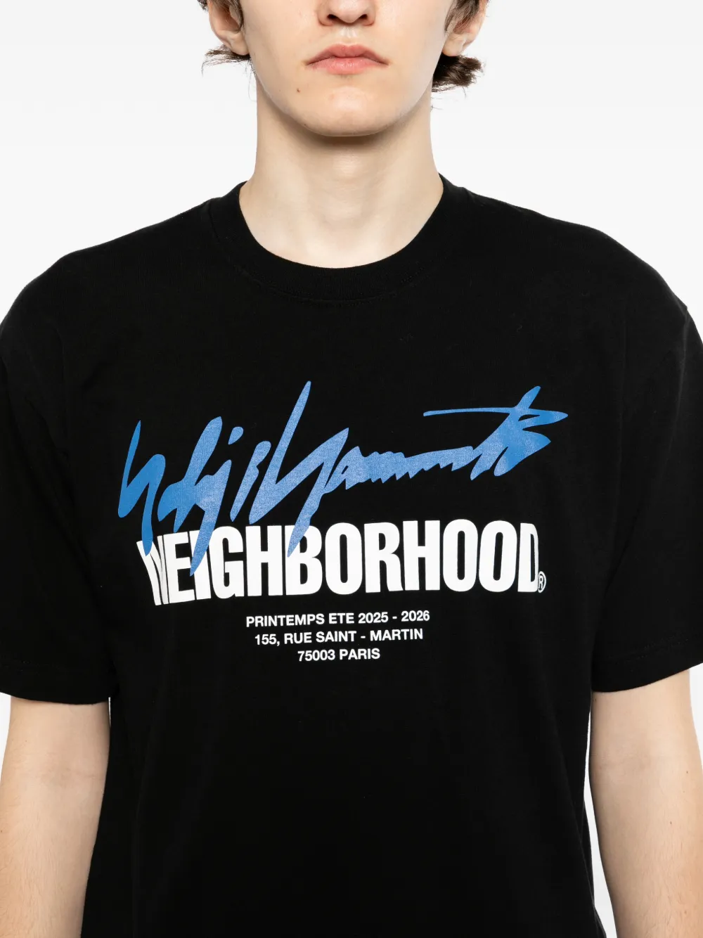 Close up of black t-shirt, showing texture of the Cotton fabric