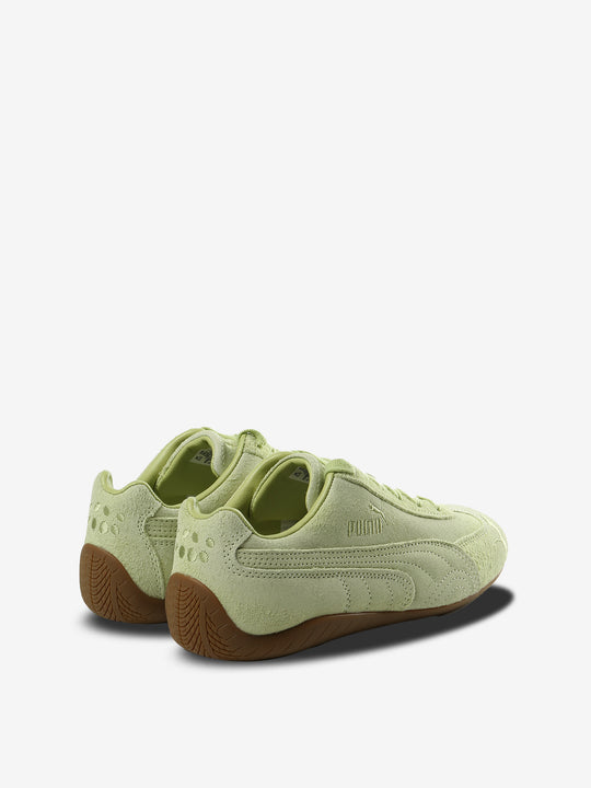 Green sneakers, side view