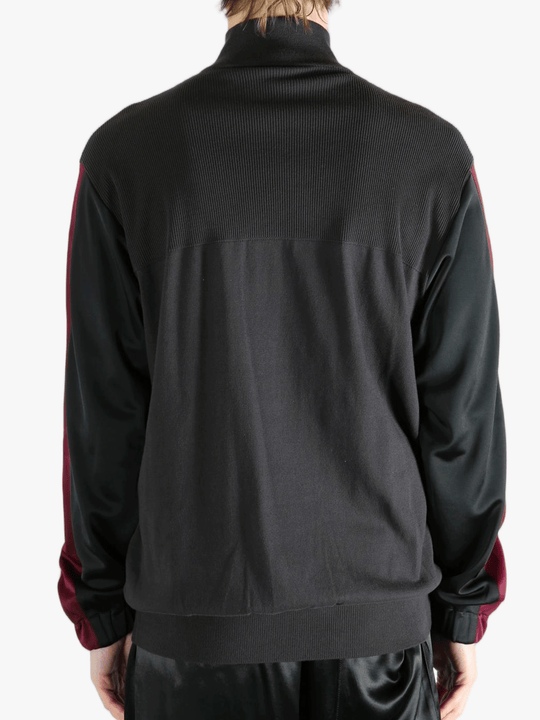 Black hoodie worn by a person, showing the hoodies fit