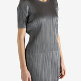 Grey shirts worn by a person, showing the shirts fit