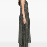 Green dress  worn by a person, showing the dress's fit