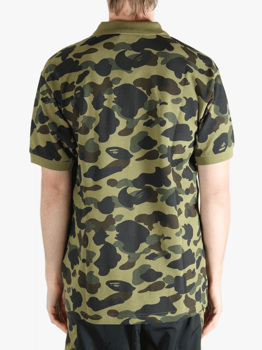 Green shirt worn by a person, showing the shit fit