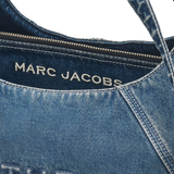 close up of blue bags, showing texture of the cotton fabric