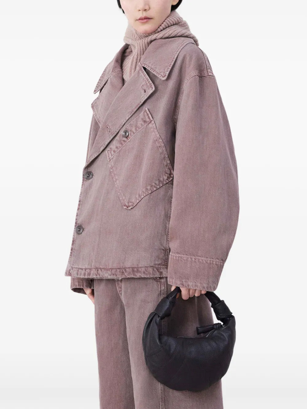 Brown bag worn by a person, showing the bag fit